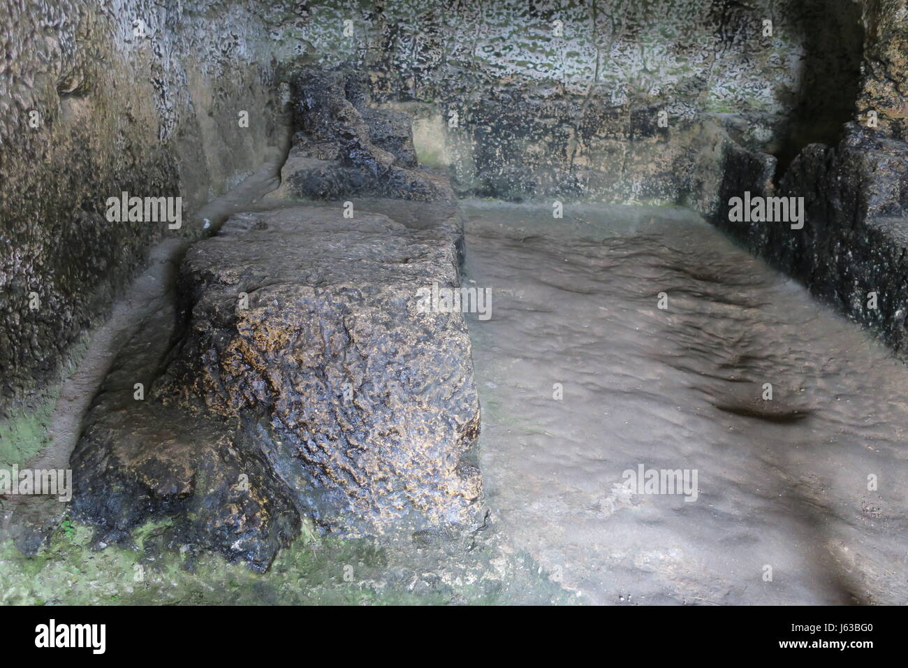 A niche cut into the rock above the ancient Greek theatre at Temenites ...