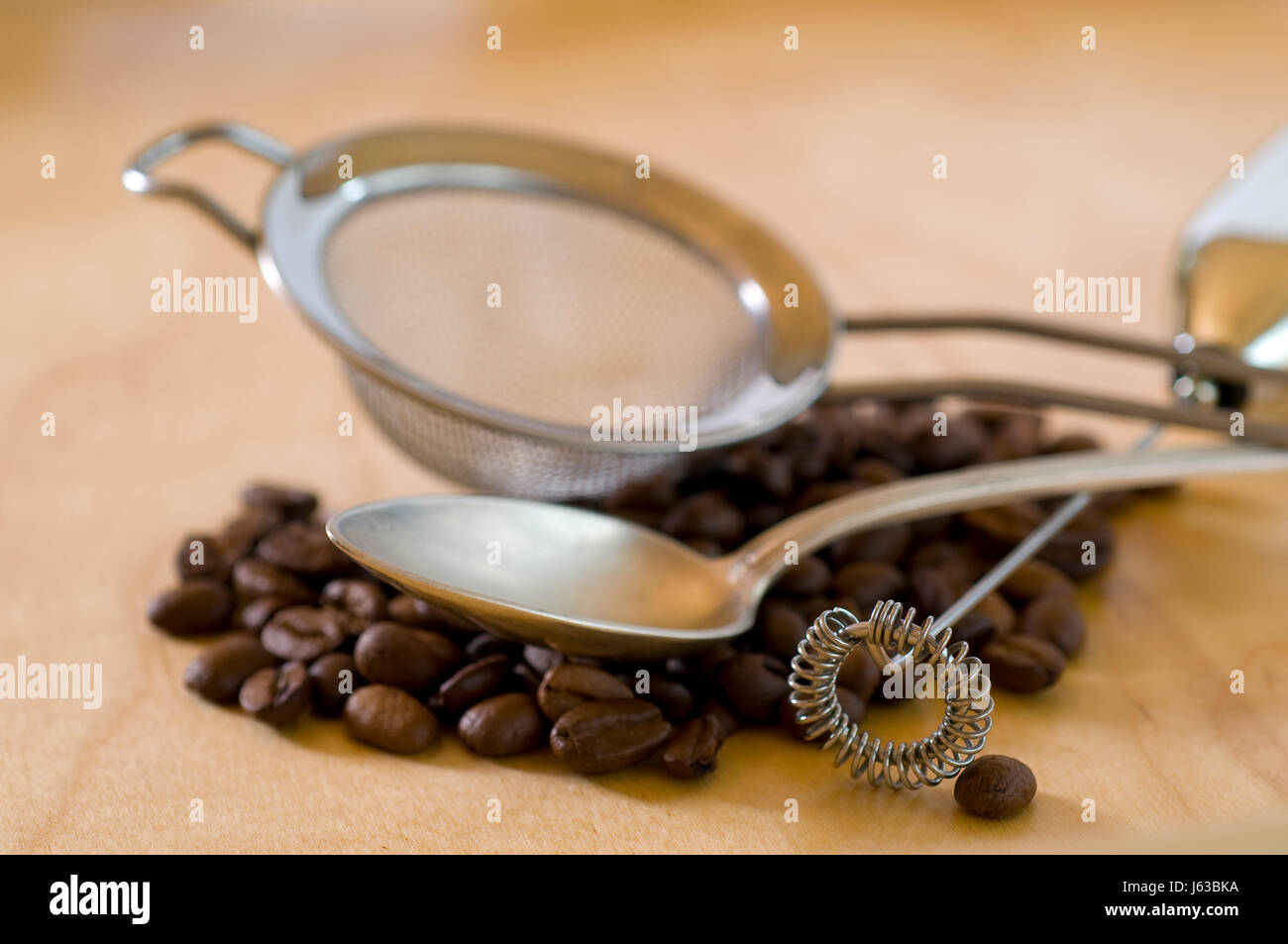 silver beans silvered coffee spoon coffee coffee bean coffee beans shine shines Stock Photo