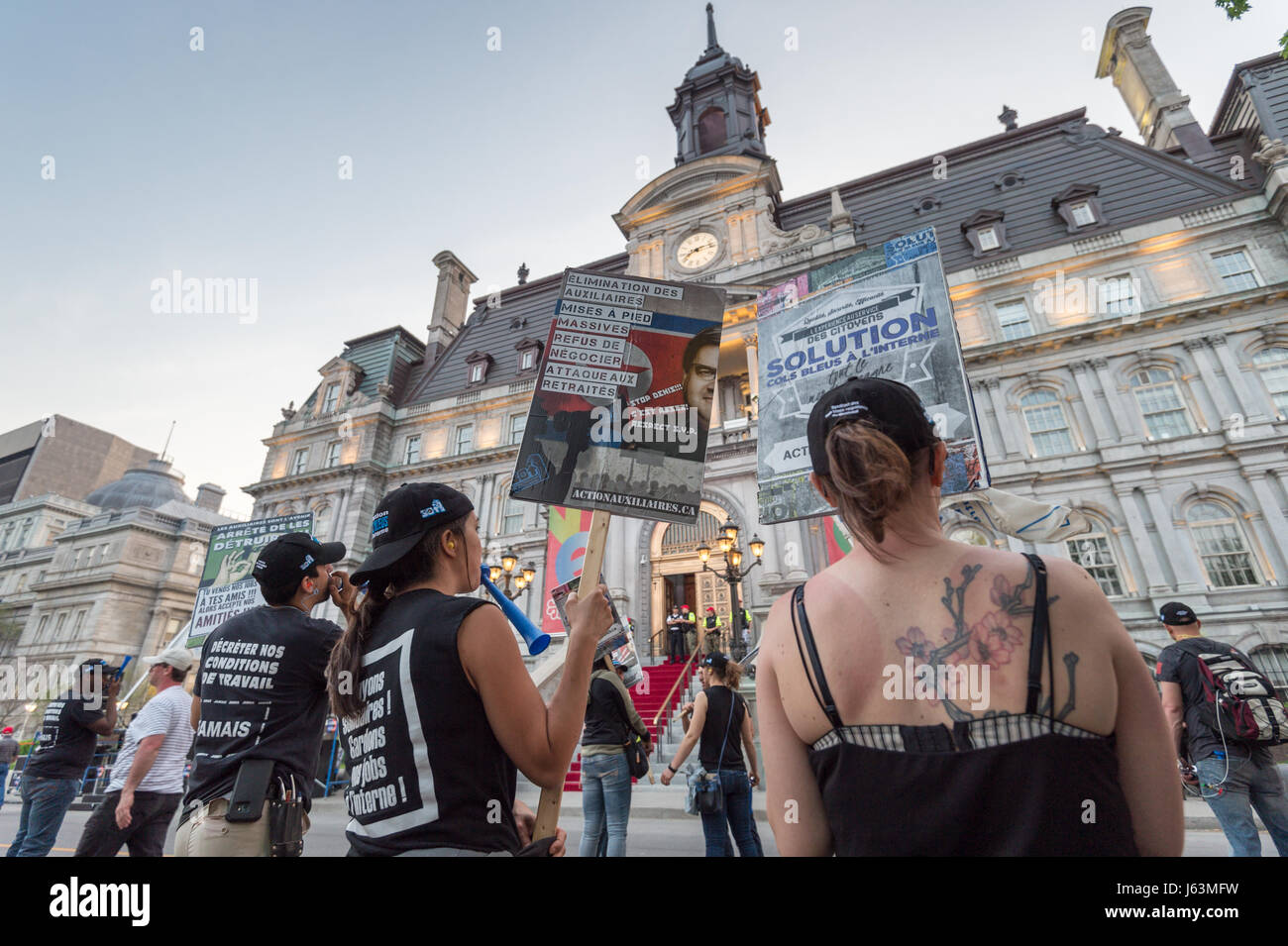 Montreal, Canada. 17th May, 2017. Blue collars protest in front of city hall Credit: Marc Bruxelle/Alamy Live News Stock Photo