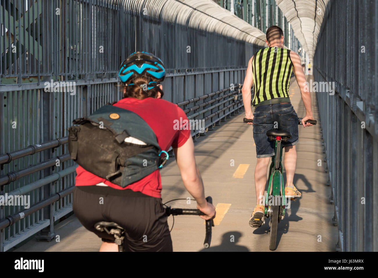 MONTREAL, CA - 18 May 2017: Cyclist on Jacques-Cartier Bridge's multipurpose path Stock Photo
