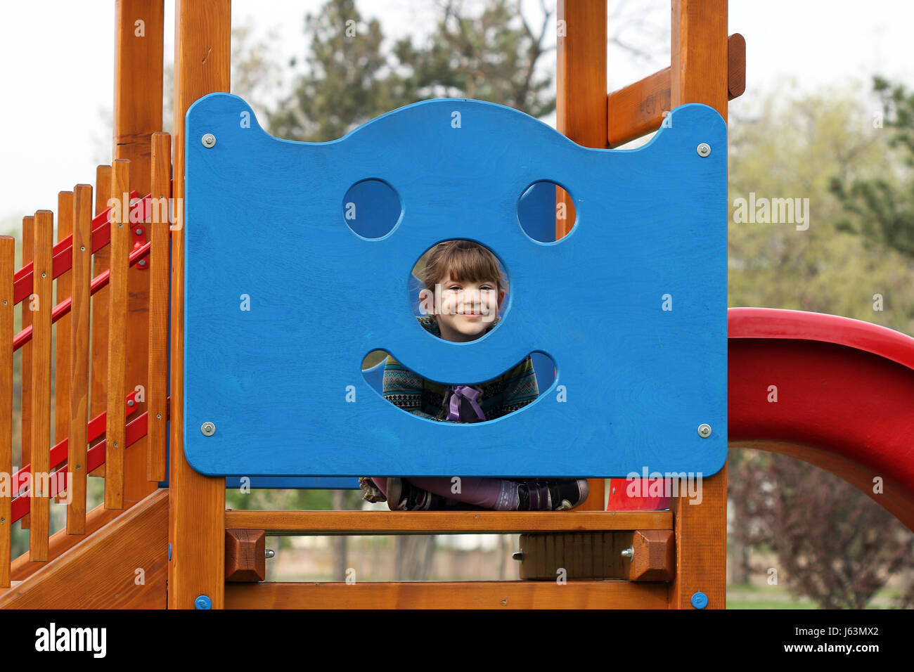 happy little girl on playground Stock Photo - Alamy