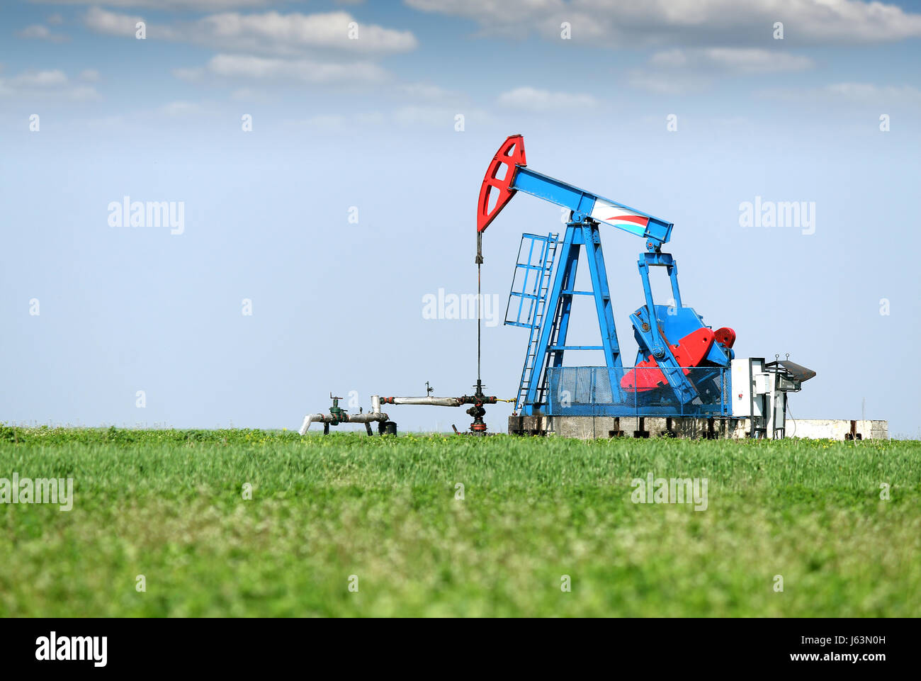 oil pump jack on oilfield Stock Photo Alamy