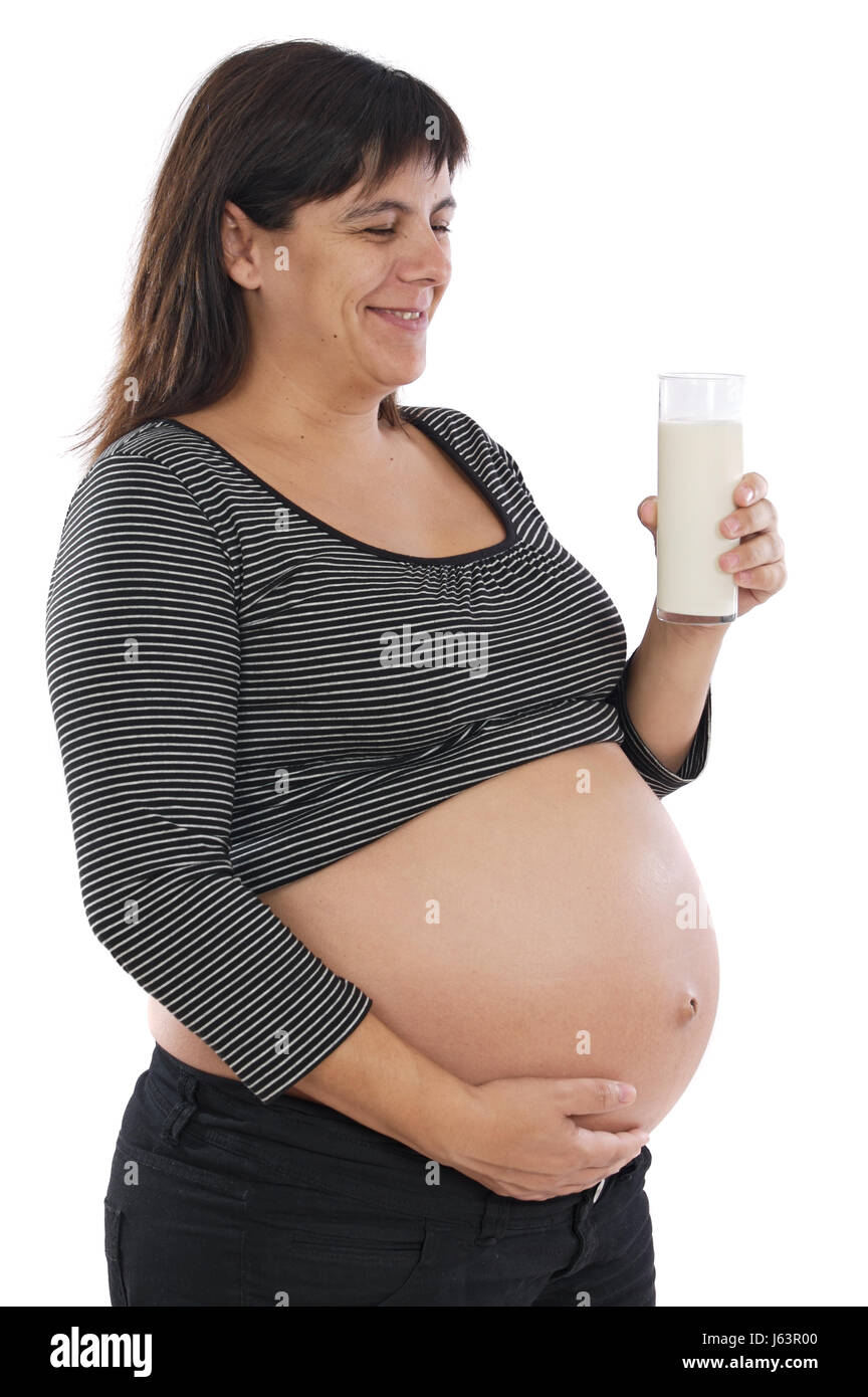 woman glass chalice tumbler milk pregnant woman humans human beings people folk Stock Photo