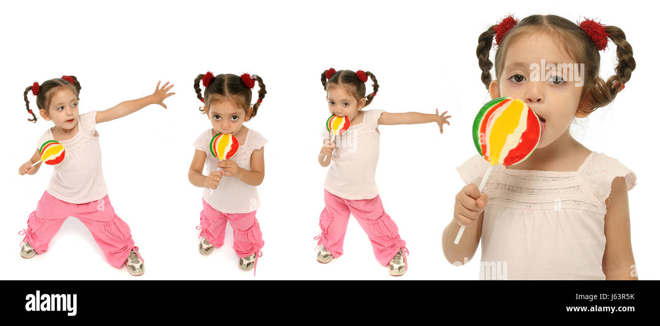 lollipop possession holding kid expressions maddening pert coquettish cute Stock Photo