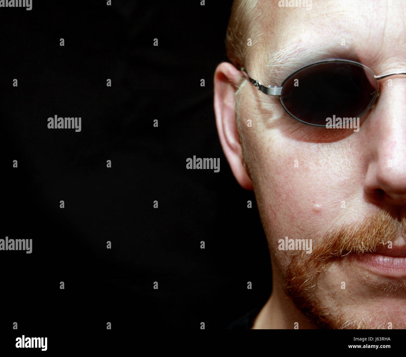 face portrait grimace sunglasses sunglass man guy mouth male masculine skin Stock Photo