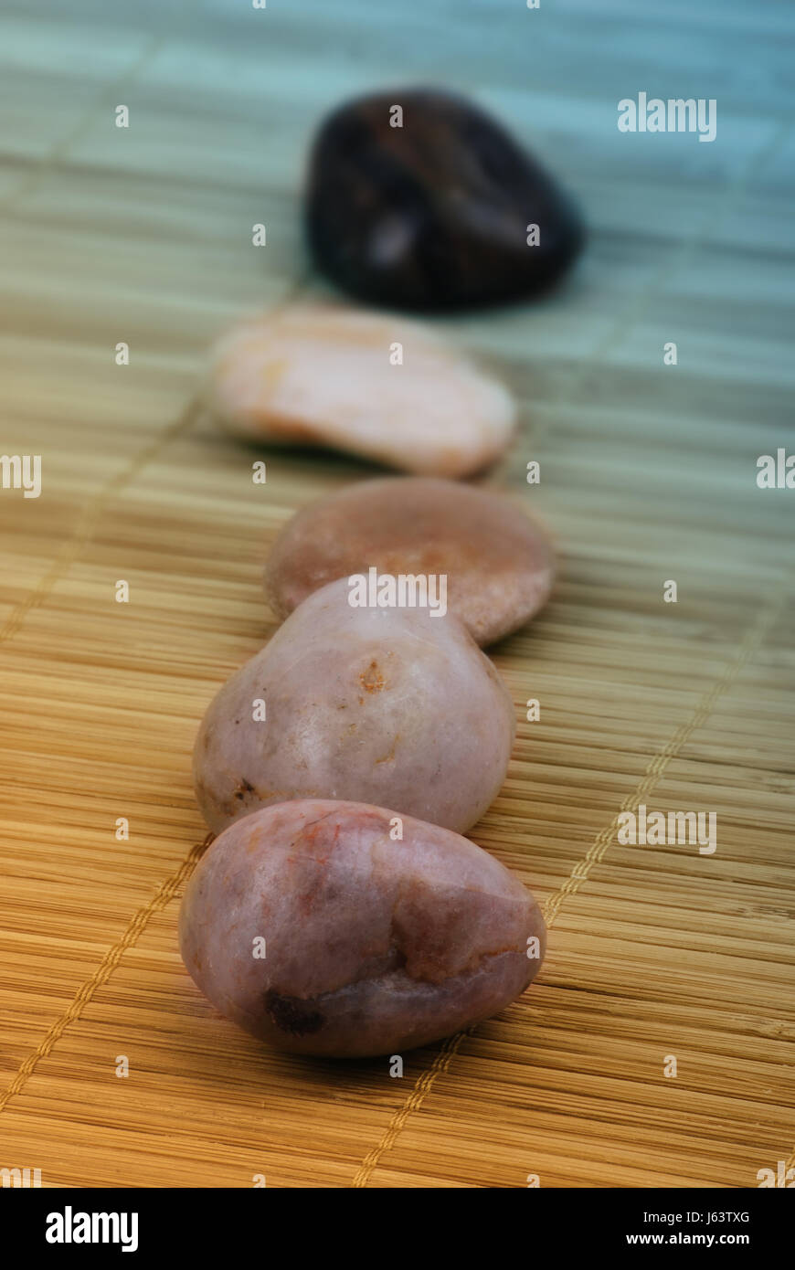 stone wellness mat silicic bast phloem nature stones natural macro close-up Stock Photo