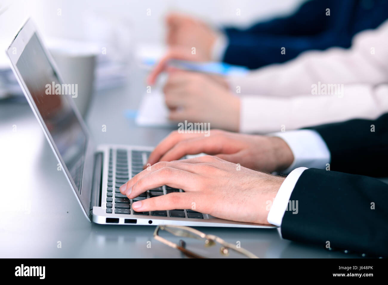 Group of business people working together in office Stock Photo - Alamy