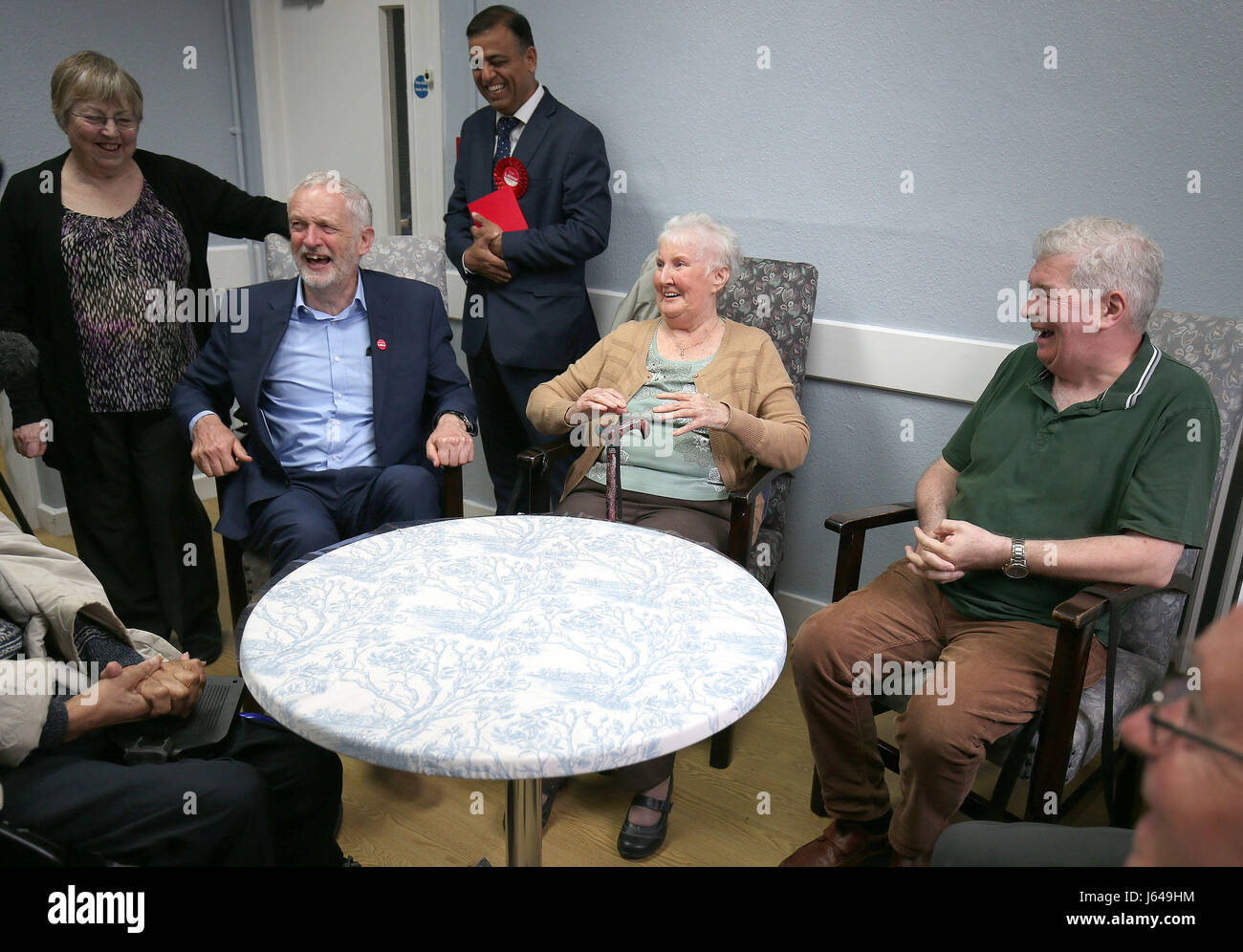 Labour leader Jeremy Corbyn (left) speaks to Pamela Hancock and John Weaver, during an election campaign visit to Bedford Guild House. Stock Photo