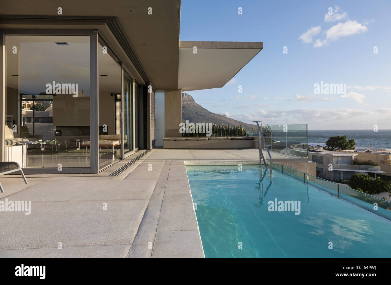 Lap swimming pool outside luxury home showcase exterior Stock Photo