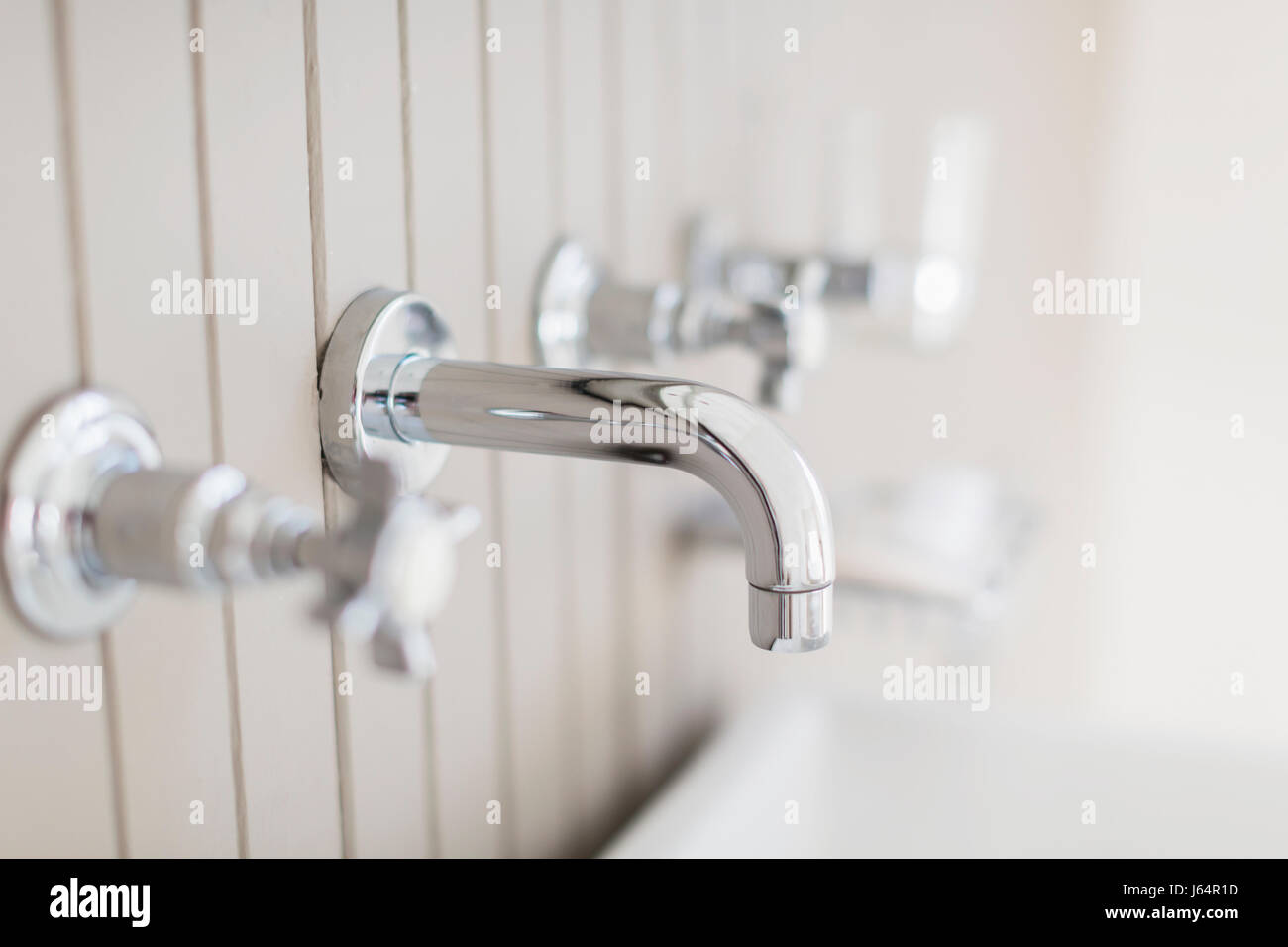 Close up modern stainless steel bathtub faucet Stock Photo Alamy