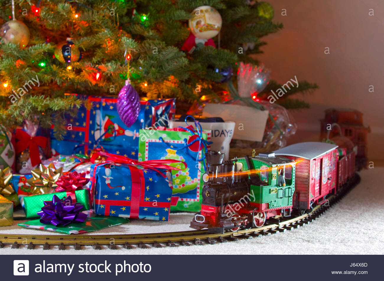 train track around christmas tree