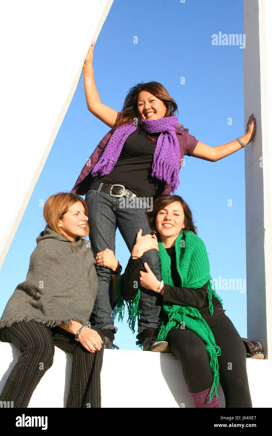 woman women three put sitting sit stand blue friendship successful succesful Stock Photo