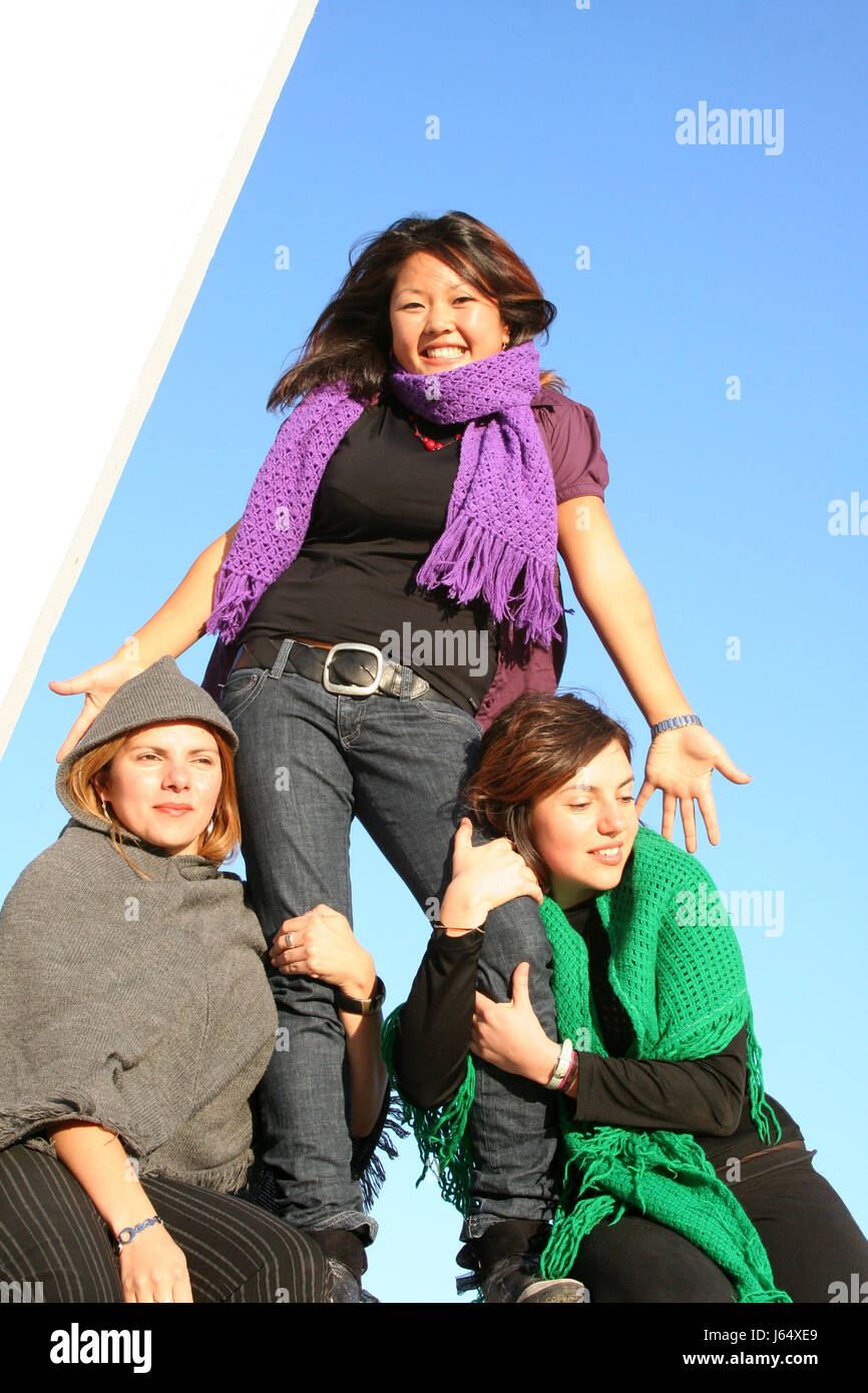 woman women three blue laugh laughs laughing twit giggle smile smiling laughter Stock Photo