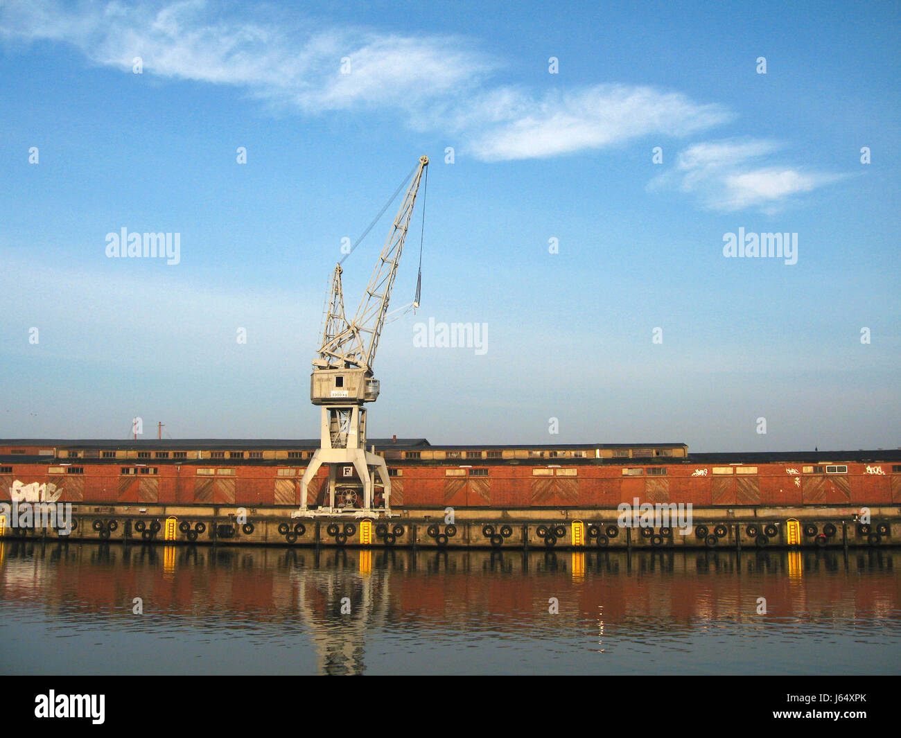 harbor sightseeing Hanseatic city harbours luebeck crane buildings historical Stock Photo