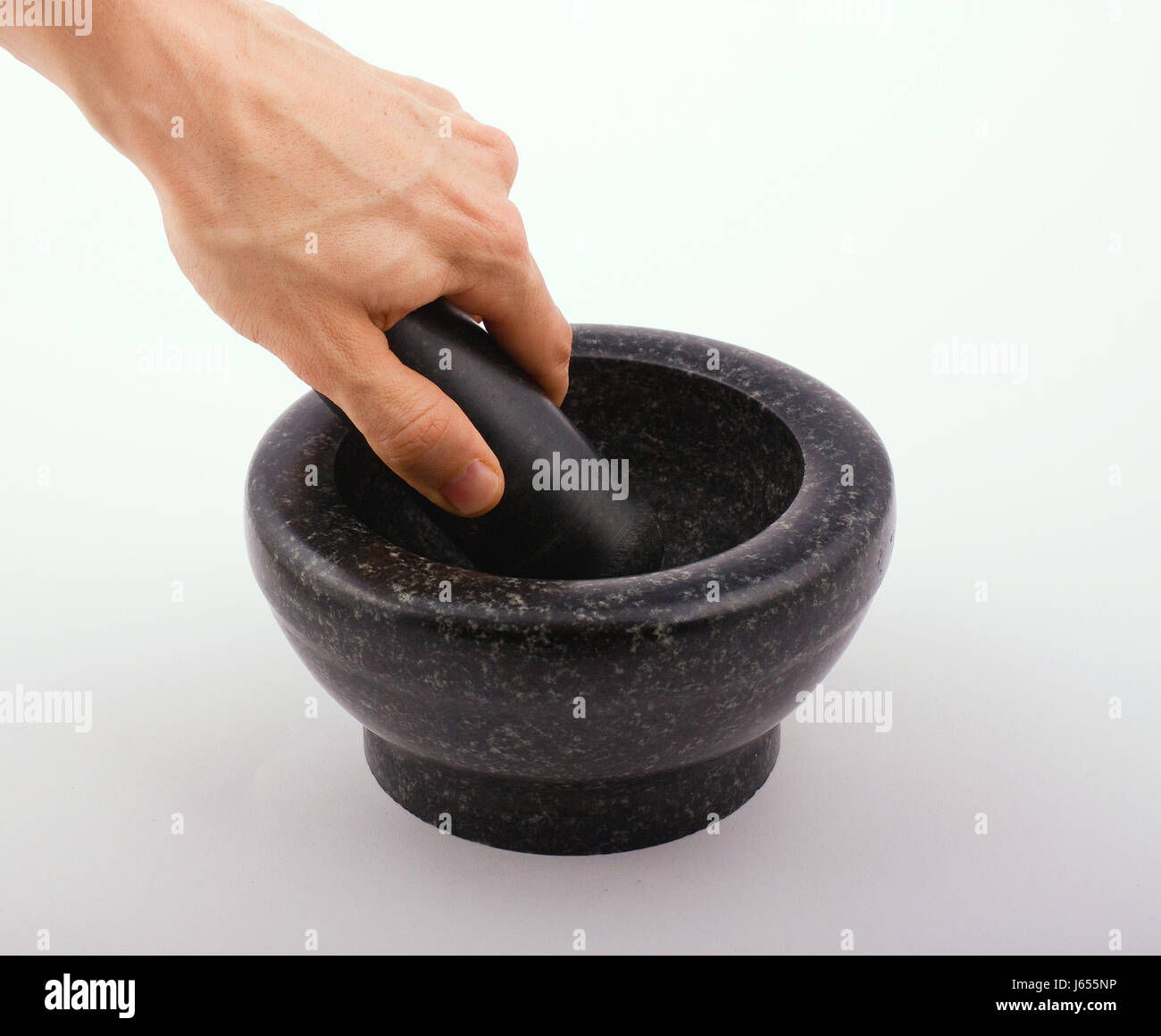 food aliment hand finger stone mortar pestle doctor physician medic medical  Stock Photo - Alamy