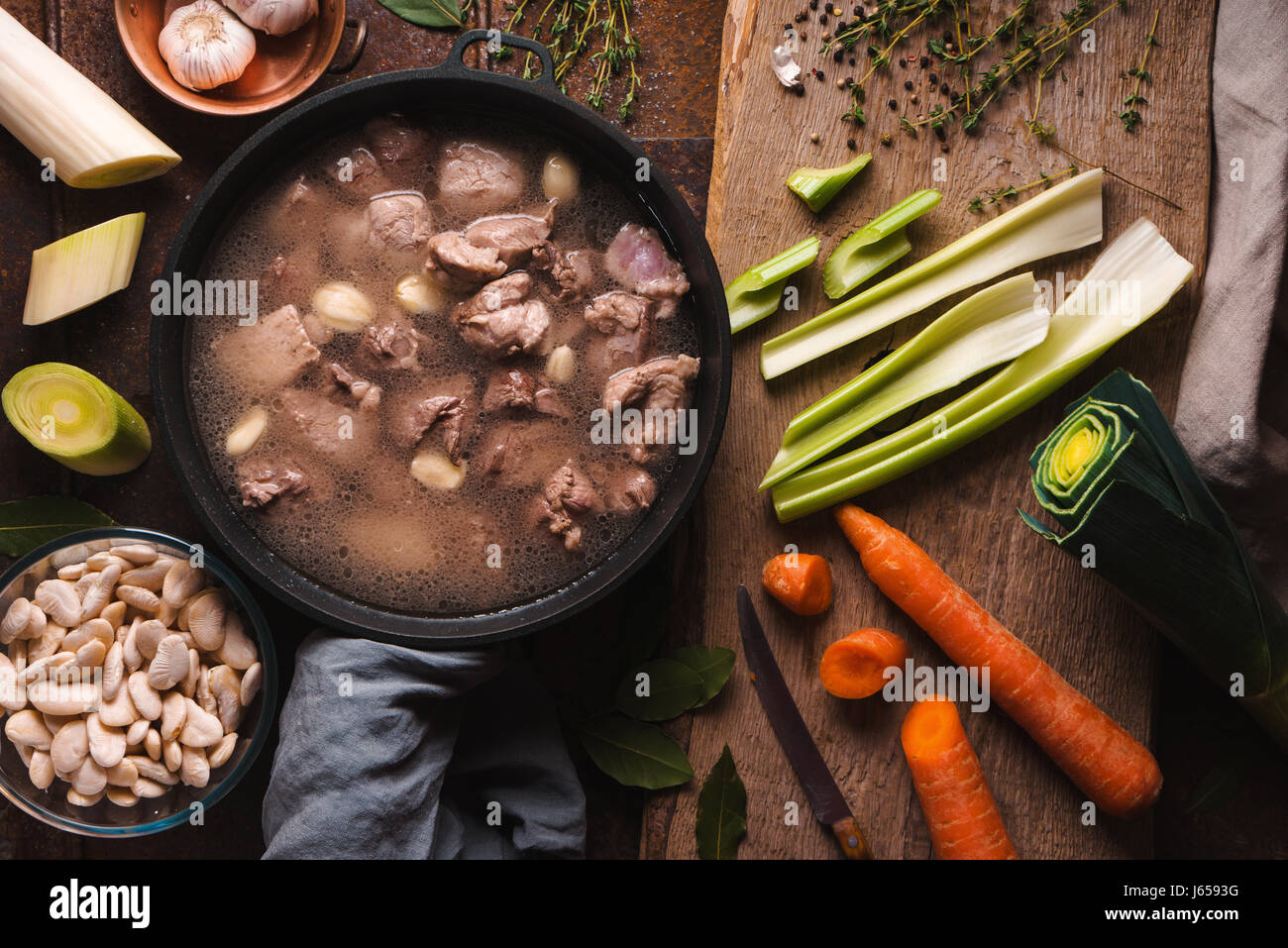 Preparation of cassoulet with pork and lamb and vegetables top view Stock Photo
