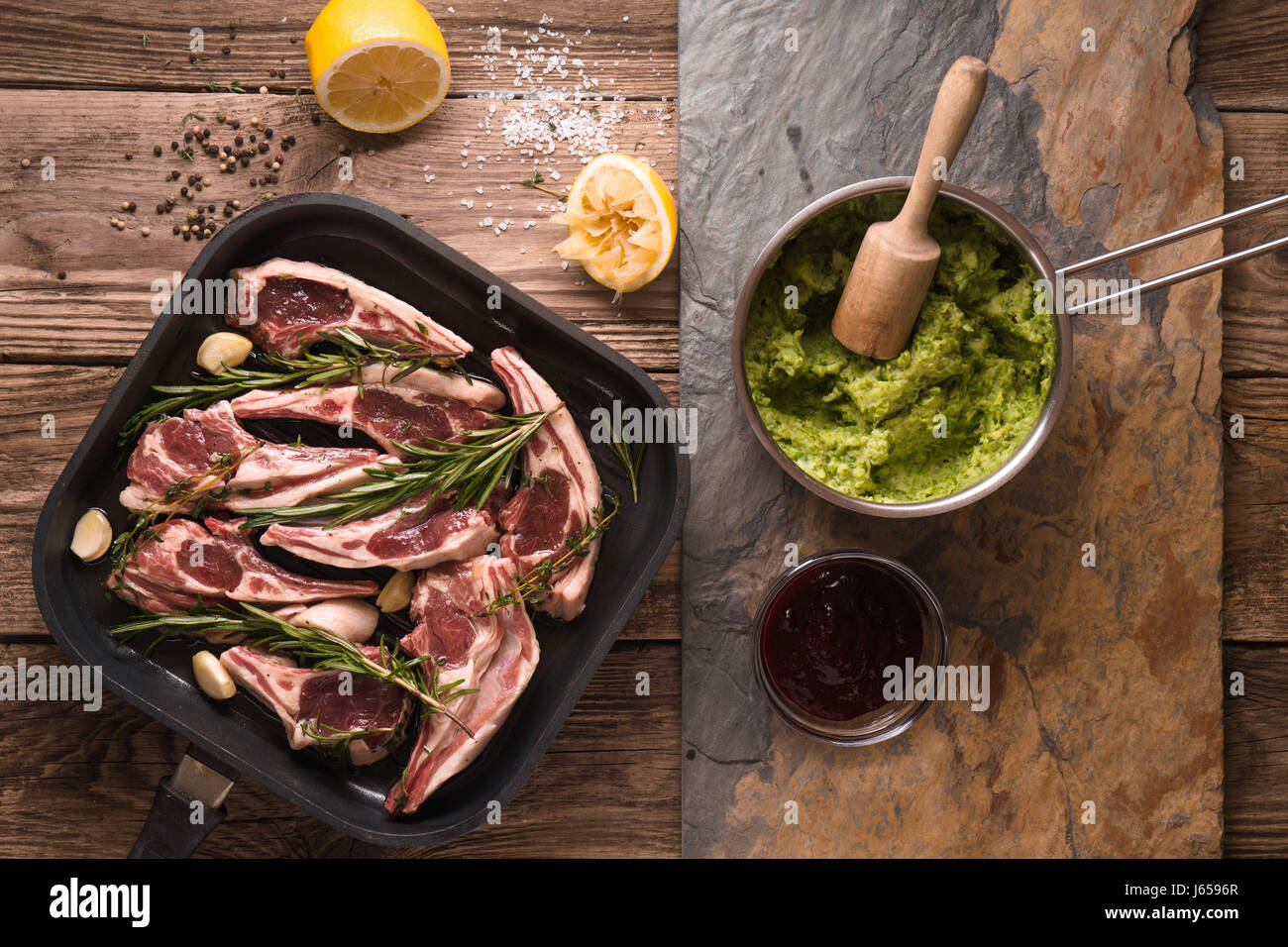 Ribs of lamb and mashed potatoes and peas Stock Photo