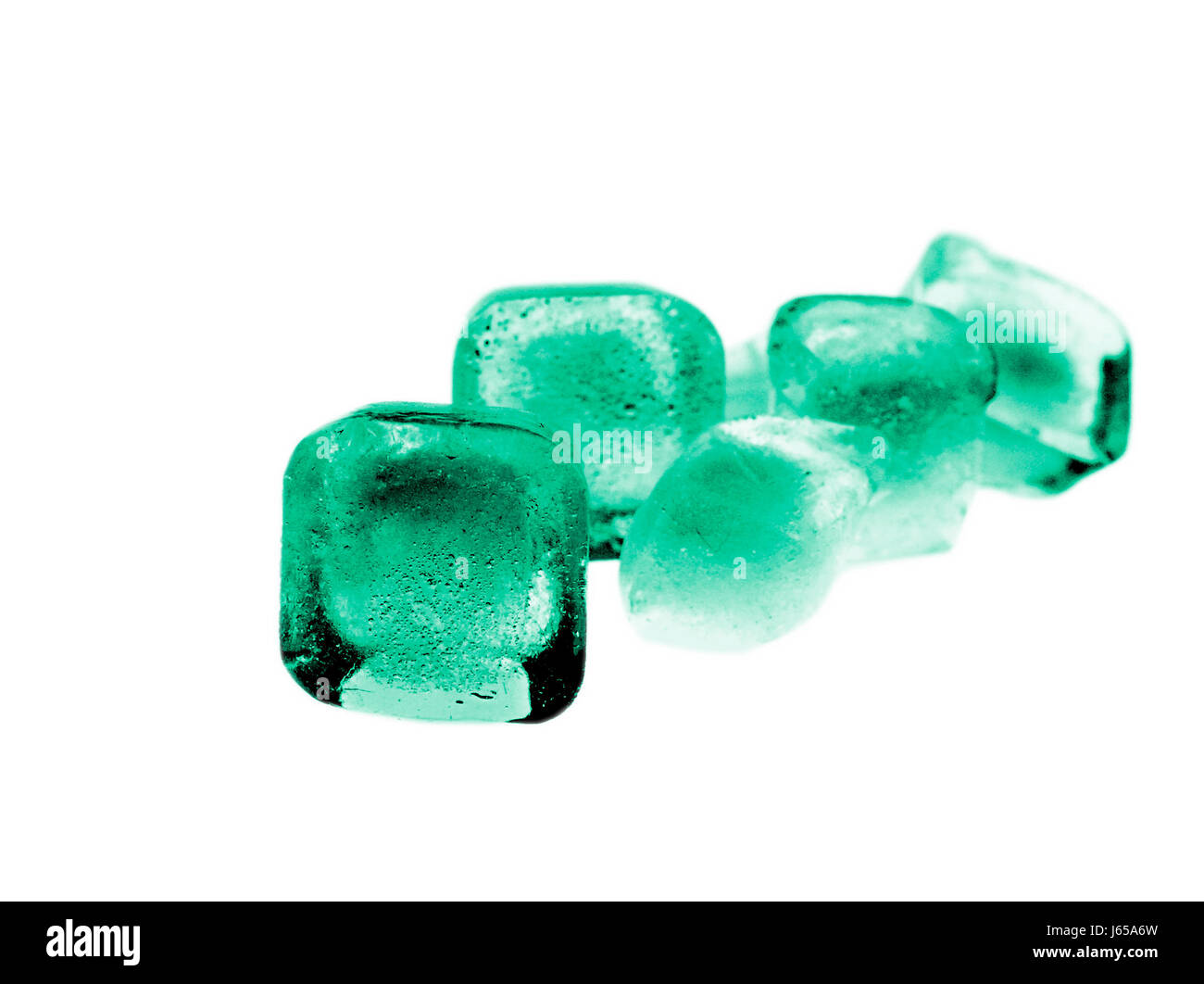 green cold ice frozen icy ice cube isolated green cold ice frozen icy ice cube Stock Photo