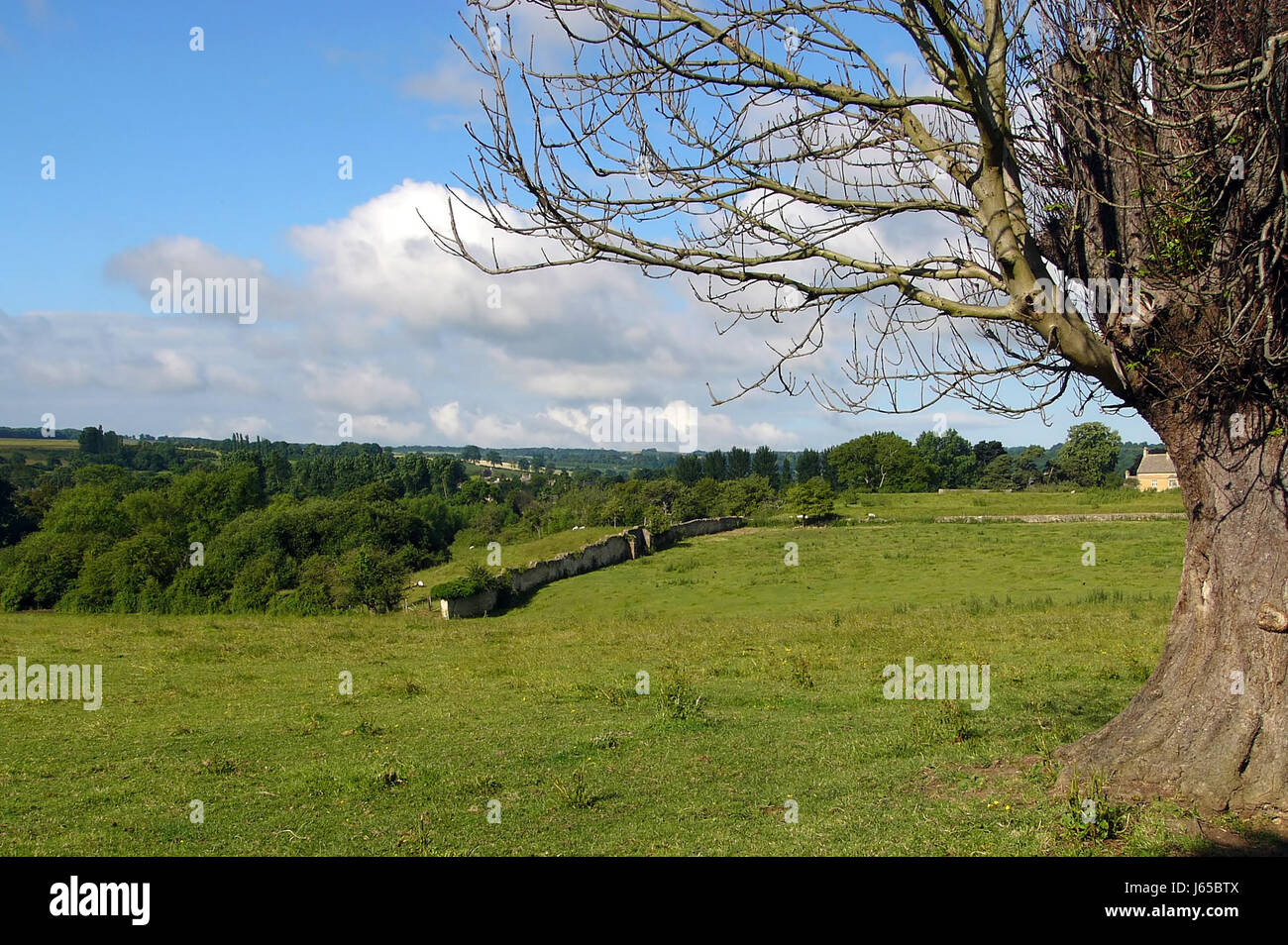 hill tourism wall england land realty ground meadow community village market Stock Photo