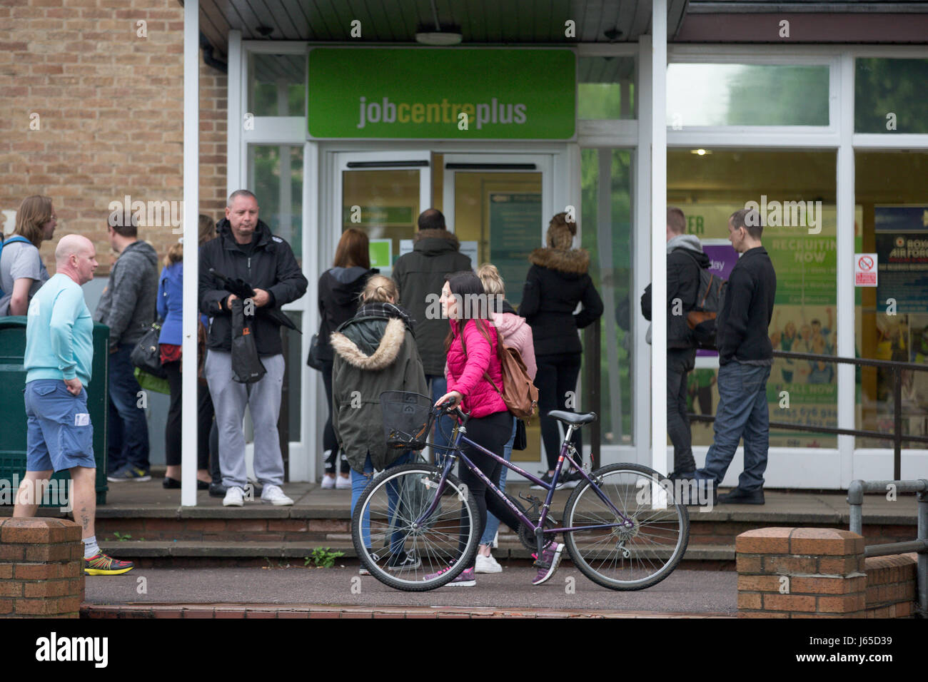 Job Centre in Cambridge on Wednesday May 17th.Today it was announced  the UK unemployment rate has fallen to 4.6%, its lowest in 42 years.   The UK unemployment rate has fallen to 4.6%, its lowest in 42 years, as inflation outstrips wage growth, official figures show. The number of people unemployed fell by 53,000 to 1.54 million in the three months to March, said the Office for National Statistics (ONS). Average weekly earnings excluding bonuses increased by 2.1%. On Tuesday, figures showed inflation hit 2.7% in April, up from 2.3%, its highest since September 2013. The jobless rate has not b Stock Photo