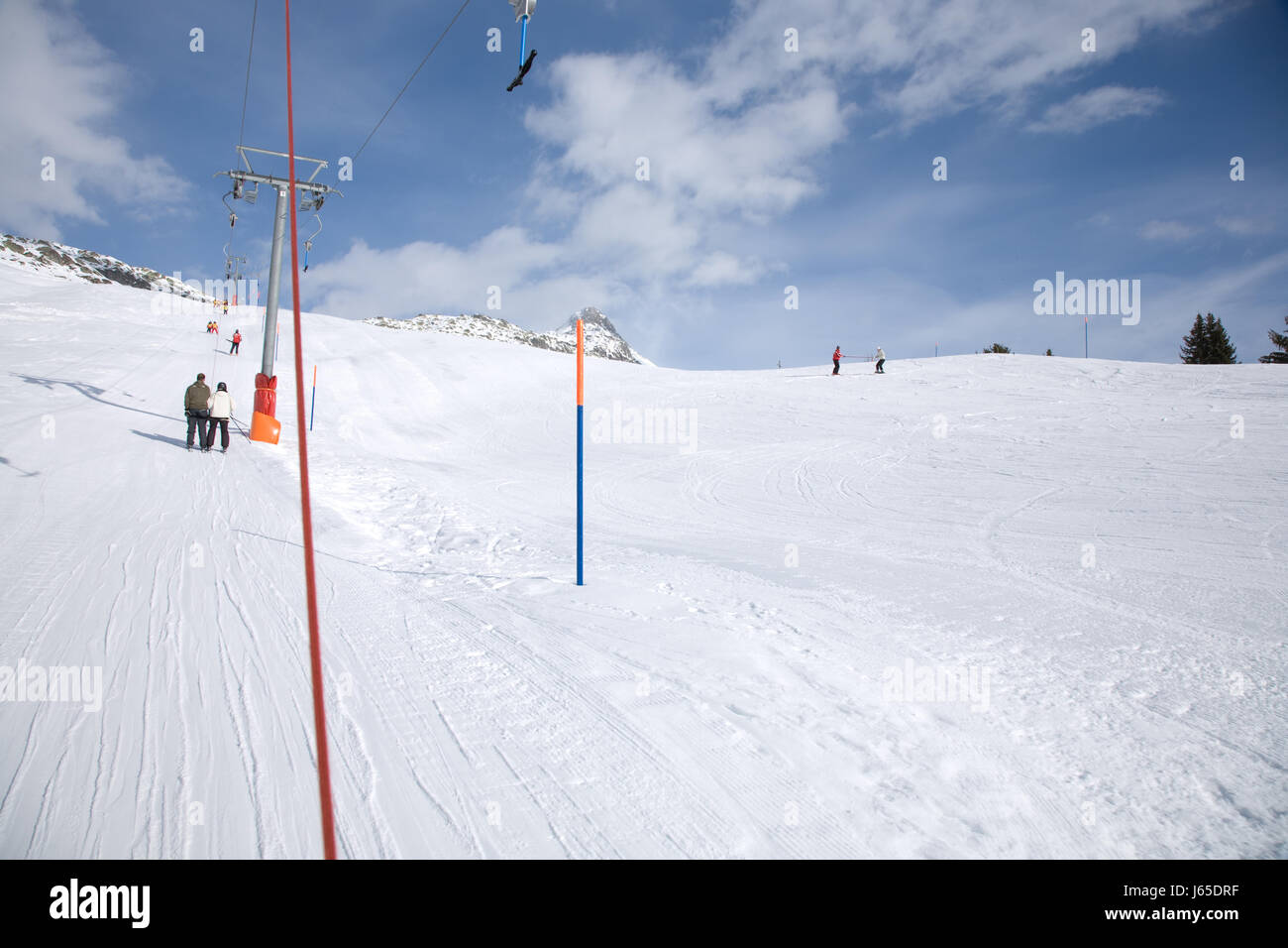 lust addiction tendency track ski runway ski skiing ski-lift blue mountains Stock Photo