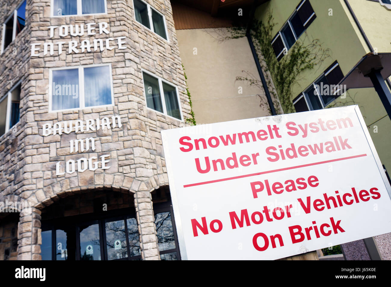 Michigan Frankenmuth,German ethnic community,Bavarian Inn,Lodge,building,hotel,tower,entrance,front,outside exterior,front,entrance,sign,warning,snowm Stock Photo