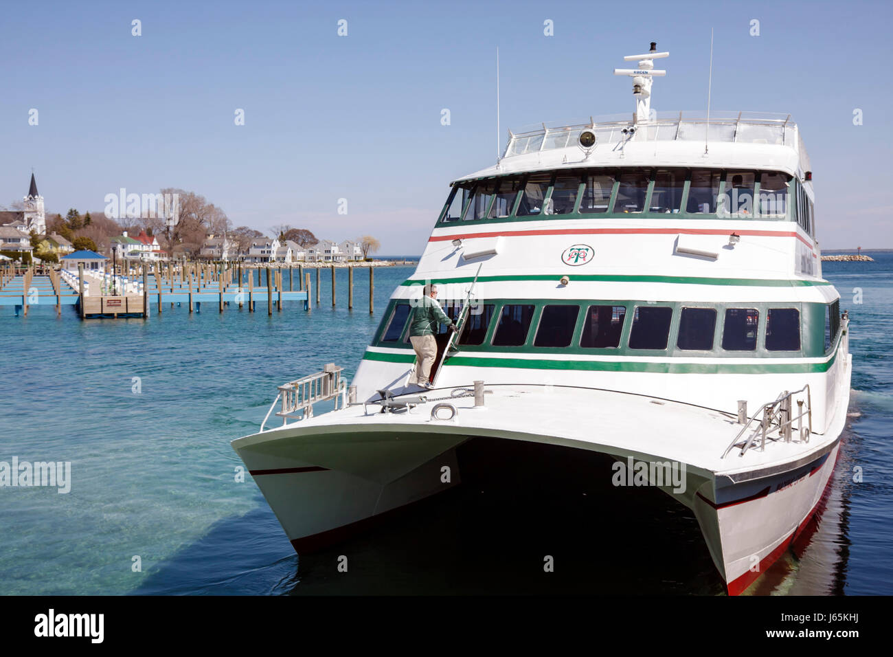 Mackinac Island Michigan,Historic State Parks Park Mackinaw,Straits of,Lake Huron,Great Lakes,Arnold Ferry Dock,catamaran,Mackinaw City,man men male,c Stock Photo
