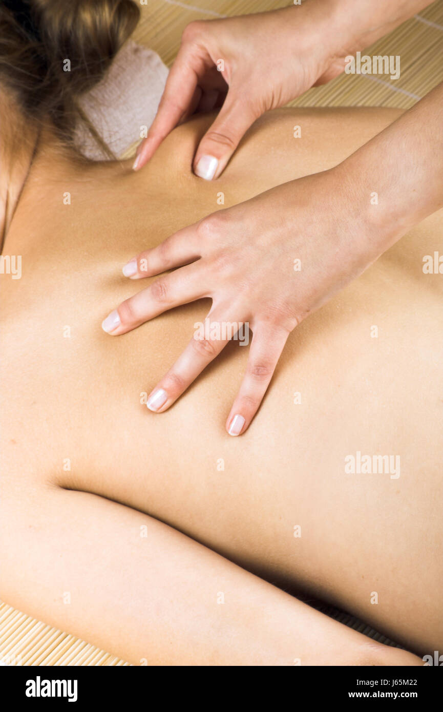 young woman while massaging Stock Photo