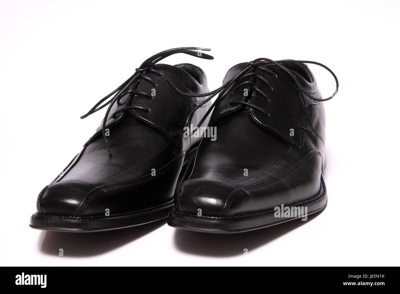 black swarthy jetblack deep black shoes leather business dealings deal business Stock Photo