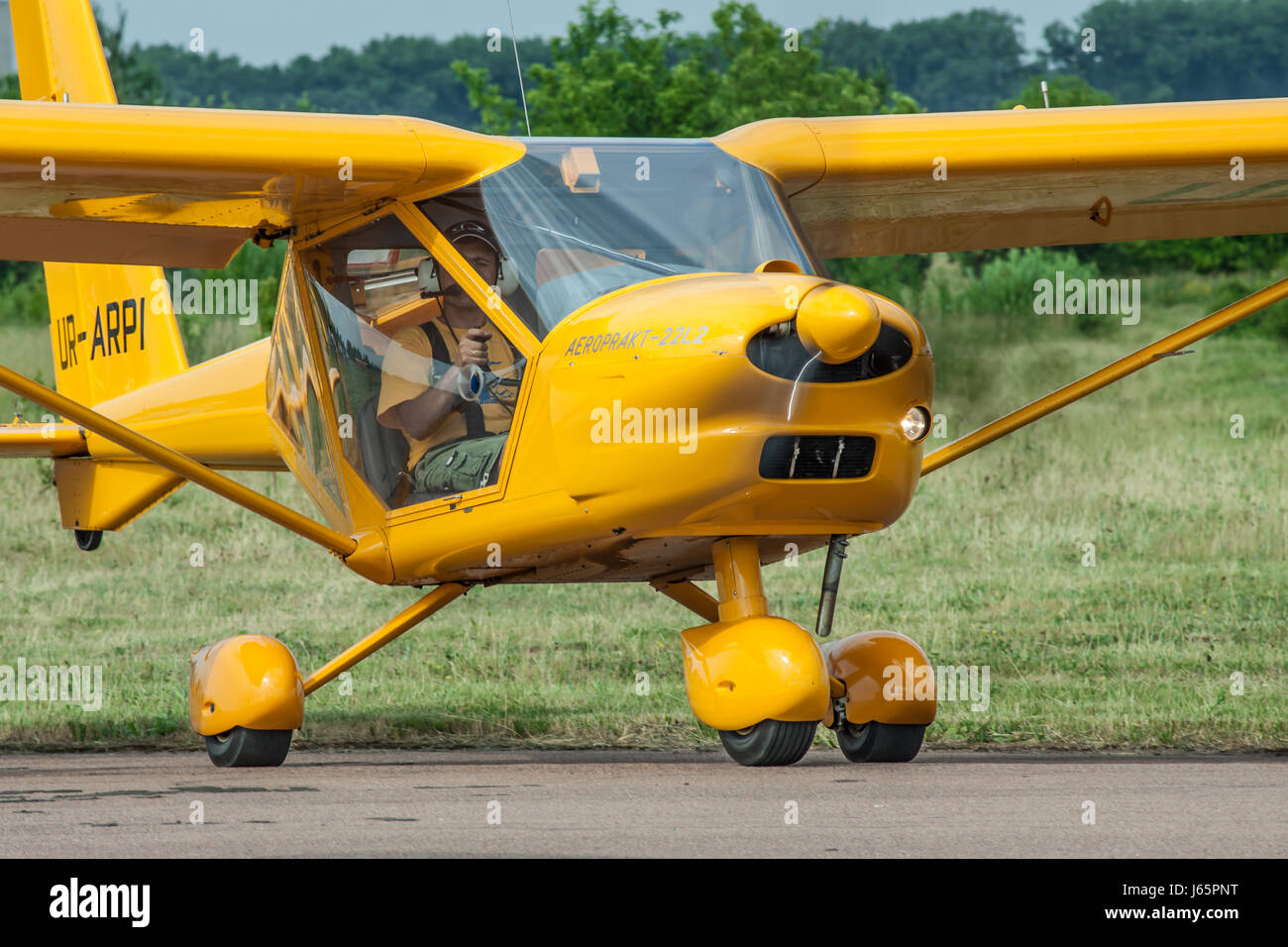 Zhitomir, Ukraine - June 17, 2011: Aeroprakt A-22 ultralight plane on runway before takeoff Stock Photo