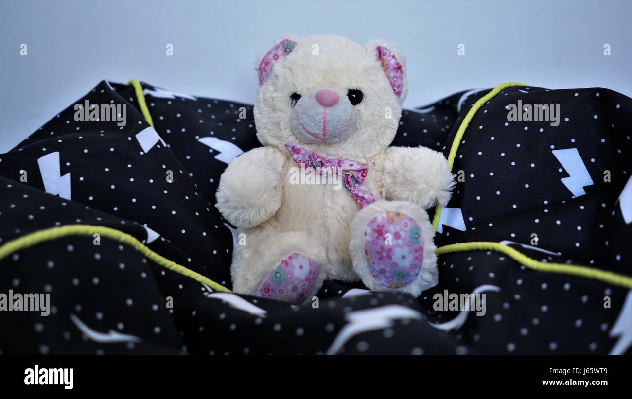 Cozy Teddy Bear. Teddy sitting cozily Stock Photo - Alamy