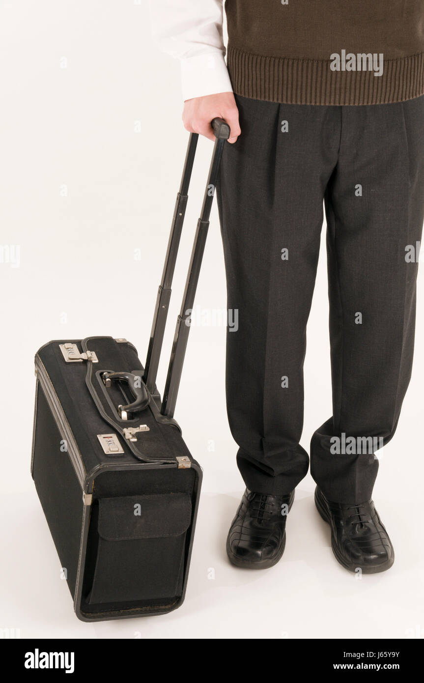 travel person unrecognizable traveling suitcases trip journey tear man legs Stock Photo