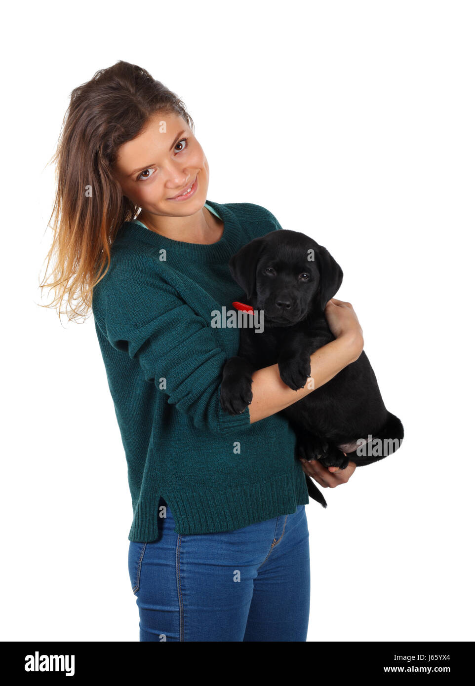 Picture of a woman with her black labrador puppy Stock Photo - Alamy
