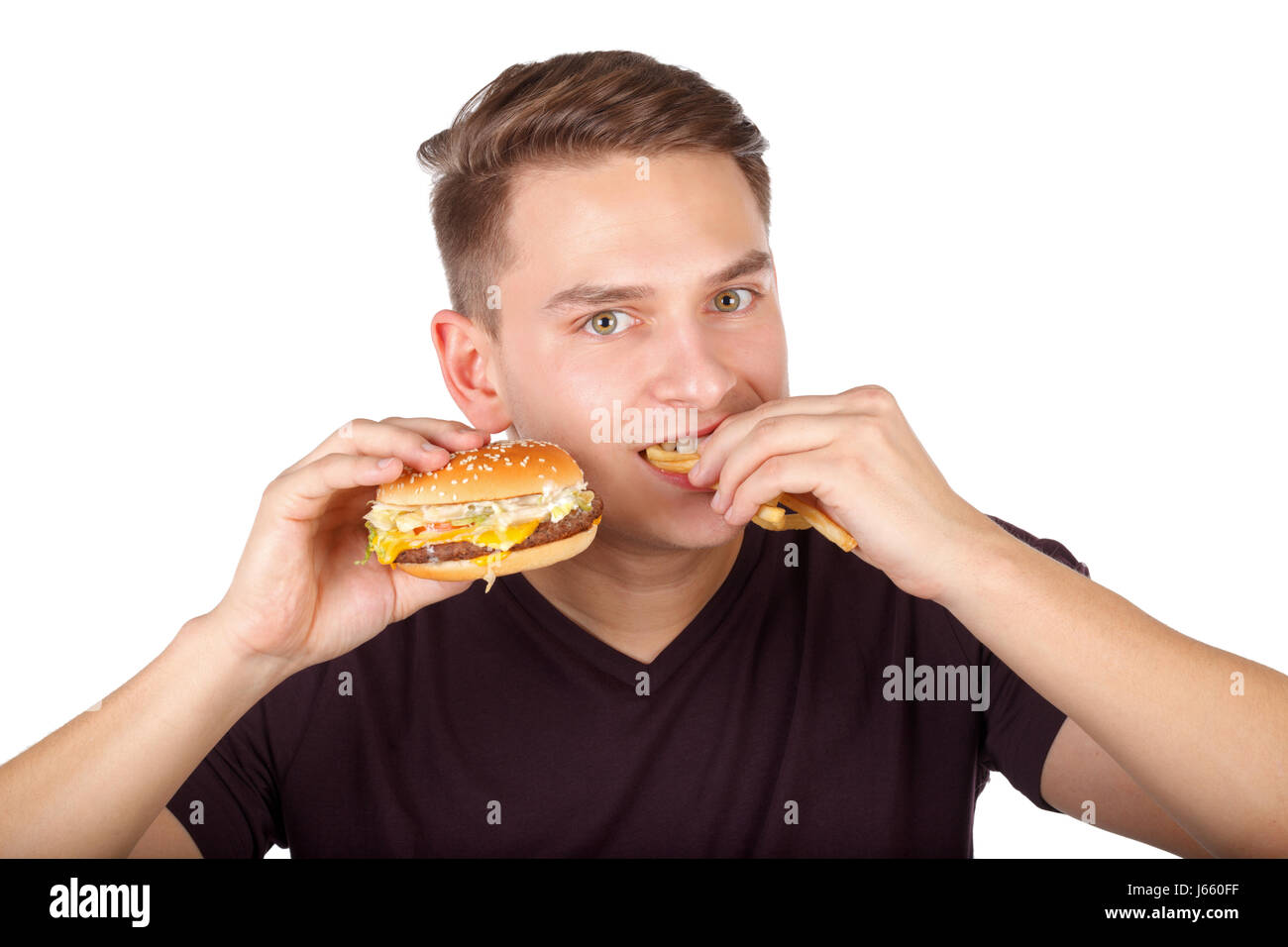 Picture of a man eating a delicious cheeseburger Stock Photo Alamy