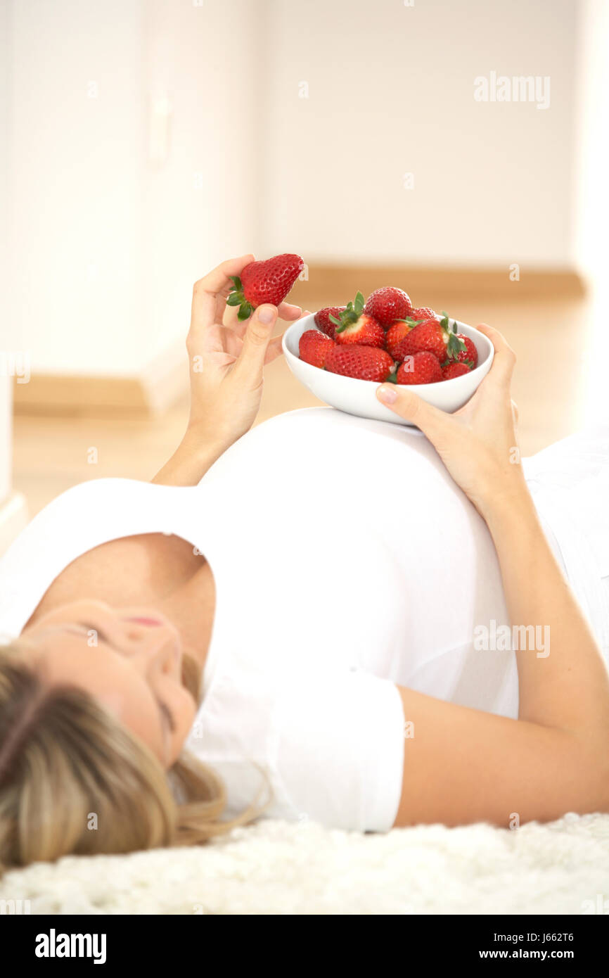 woman progenies fruits baby fruit strawberry belly tummy pregnant food