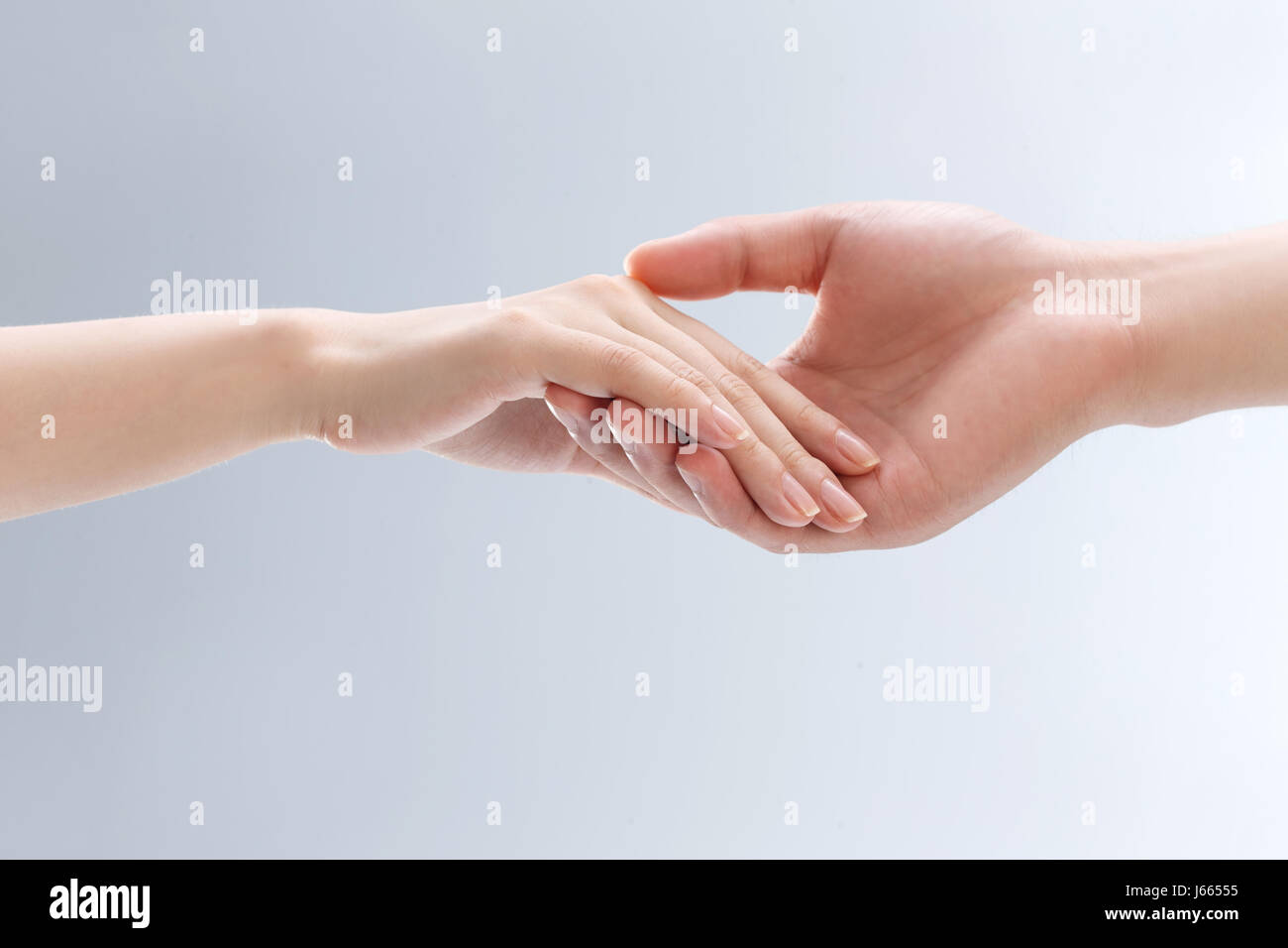 Hand Innerhalb Hand Hand in hand Stock Photo - Alamy