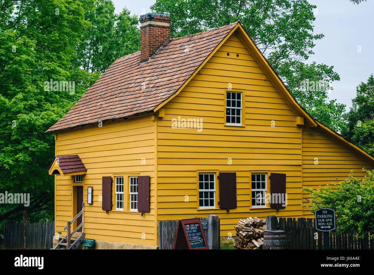 Yellow house in Old Salem, WinstonSalem, North Carolina Stock Photo