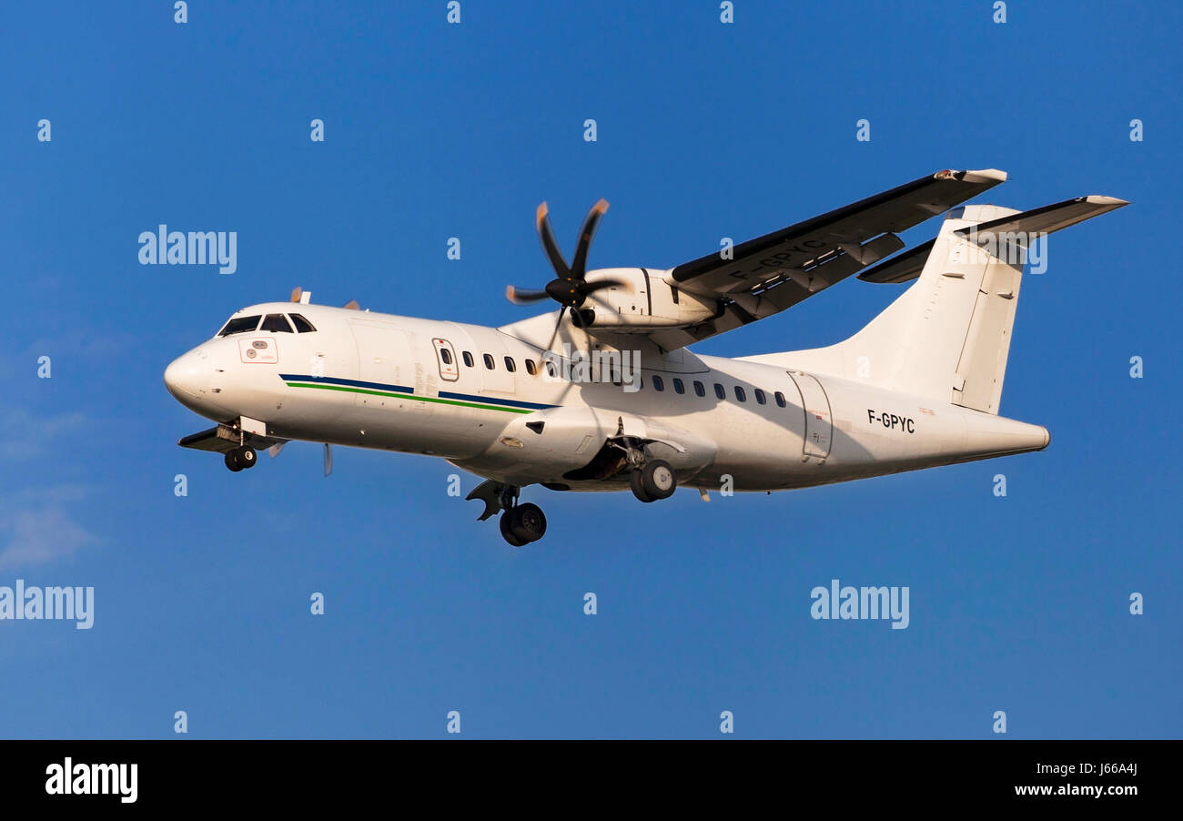 Toulouse, France - April 14, 2017: Hop! ATR 42 approaching to Toulouse-Blagnac Airport in Toulouse, France. Stock Photo