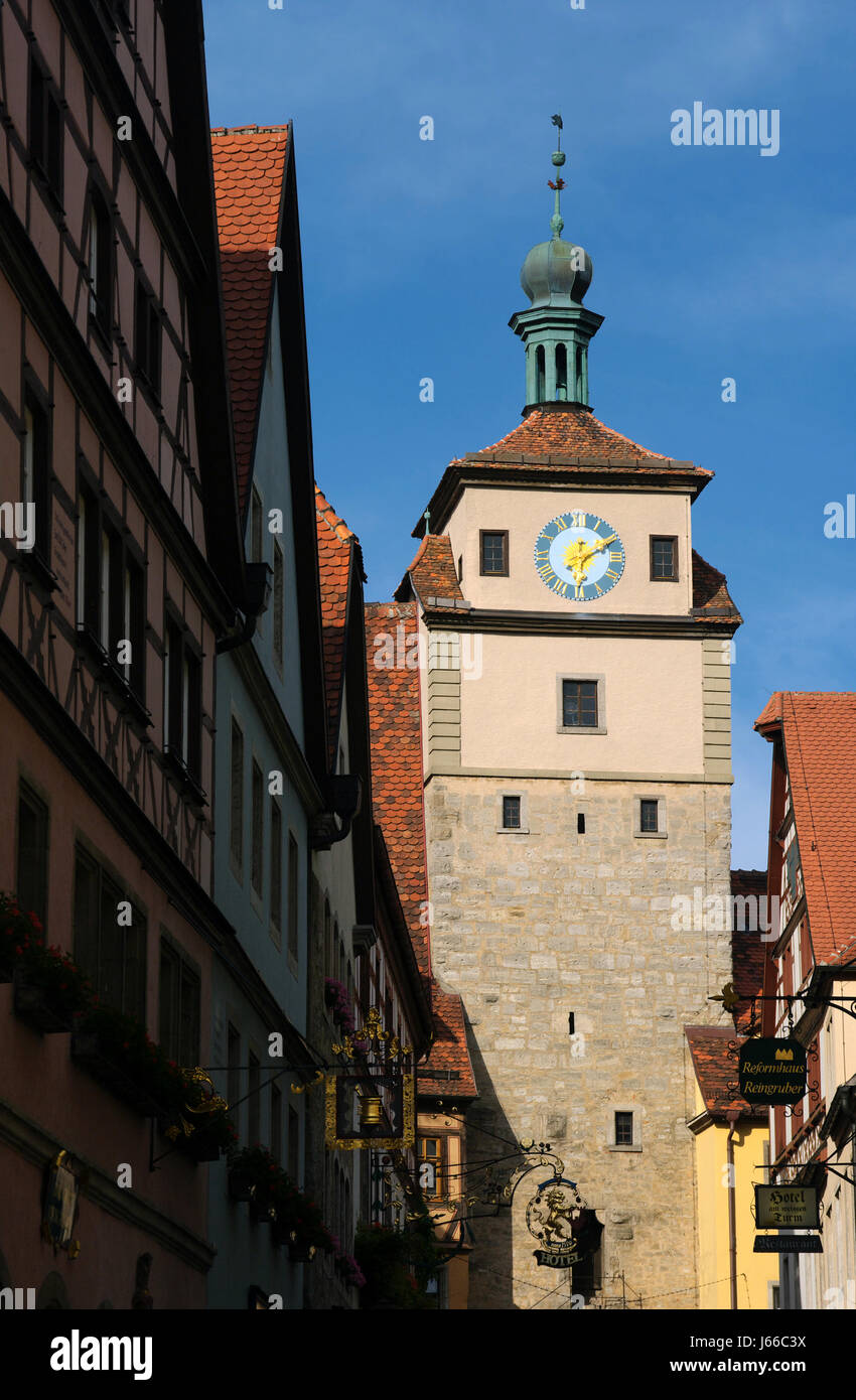 tower historical tourism clock clock tower firmament sky house building tower Stock Photo