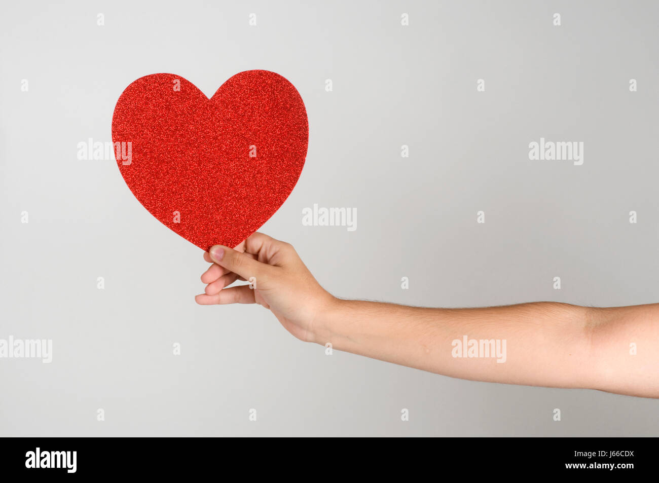 gift live arm weapon heart glitter love in love fell in love february Stock Photo