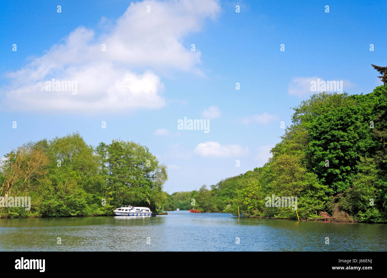 A view of the channel from Salhouse Broad to the River Bure on the Norfolk Broads at Salhouse, Norfolk, England, United Kingdom. Stock Photo