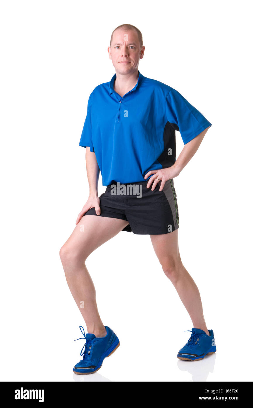 sport sports muscle strain stretching man blue sport sports black swarthy Stock Photo