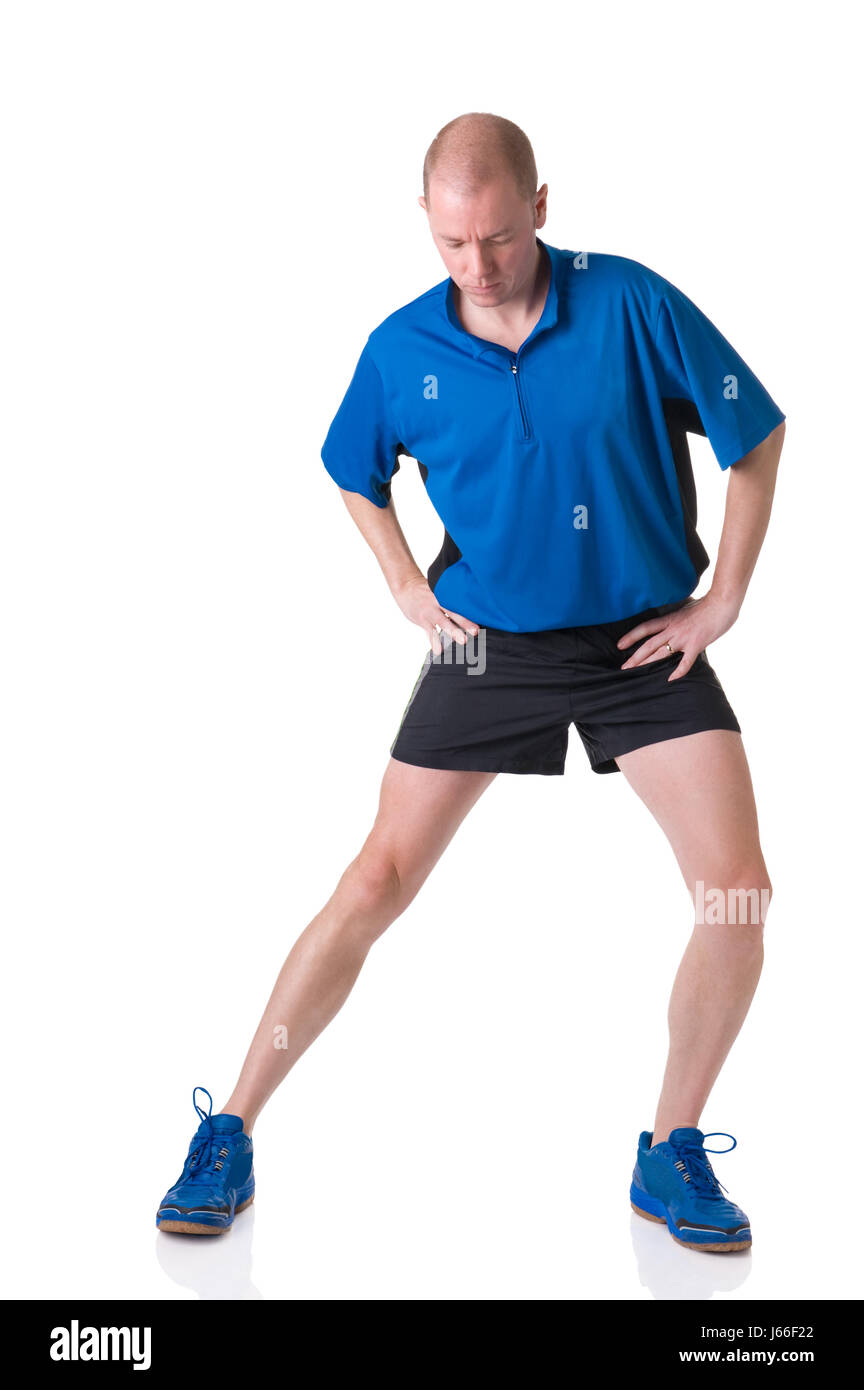 sport sports muscle strain stretching man blue sport sports black swarthy Stock Photo