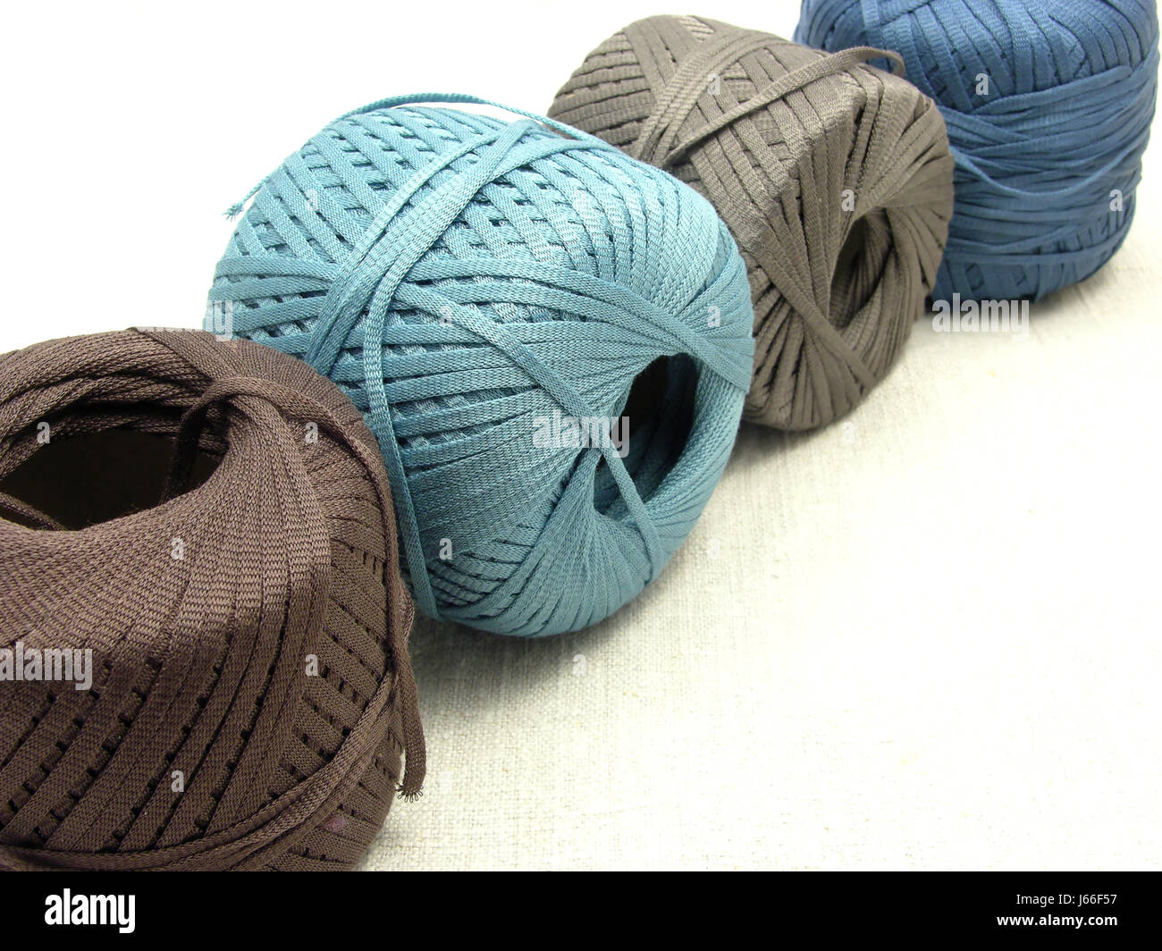 colour wool yarn ball of wool knitting wool blue colour brown brownish brunette Stock Photo