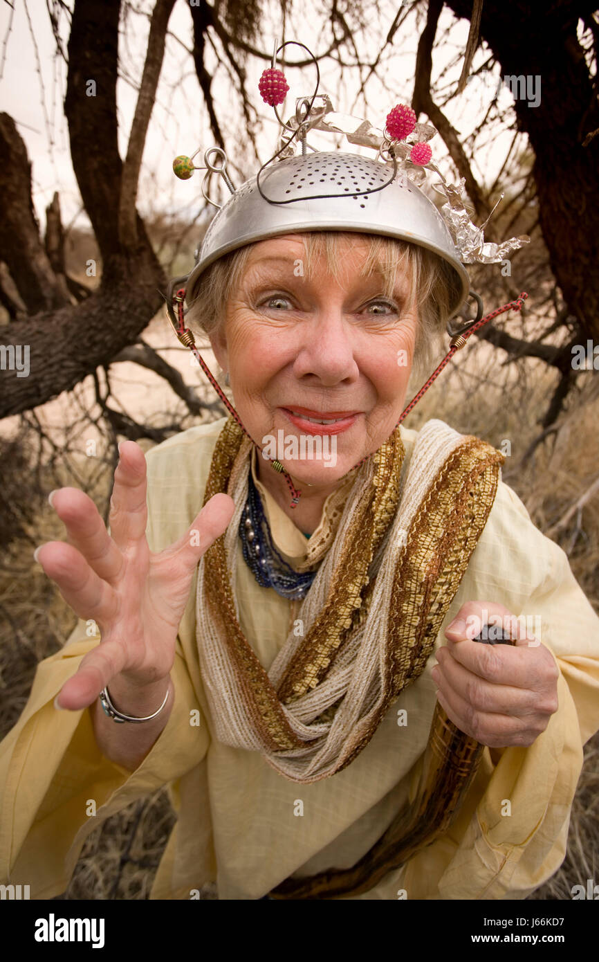 woman crazy wrinkle old schizophrenic insane bowl woman laugh laughs laughing Stock Photo