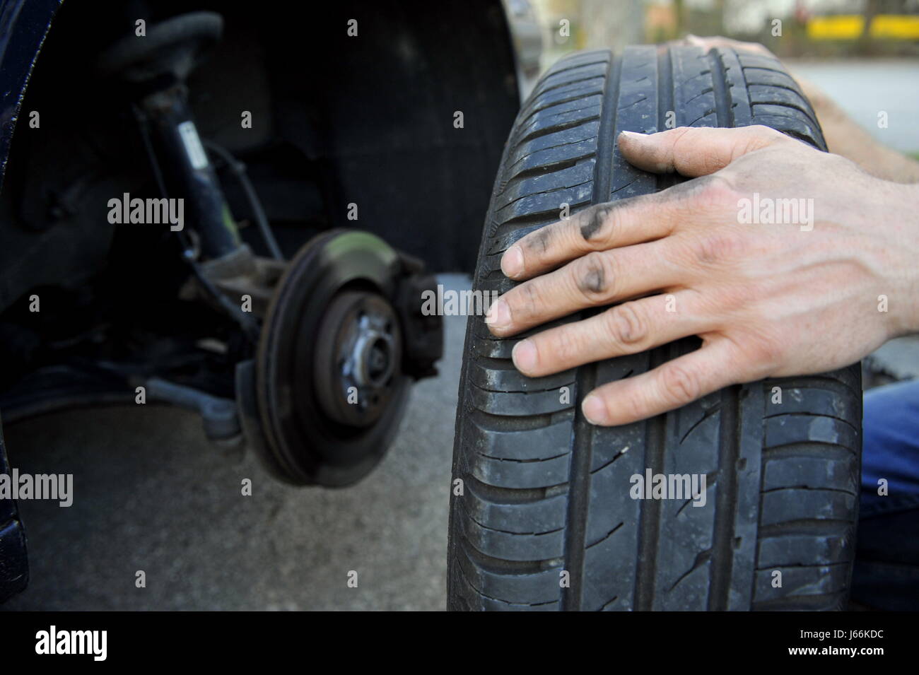 hand hands change of tyres tyre tire tyres motor vehicle changing bill