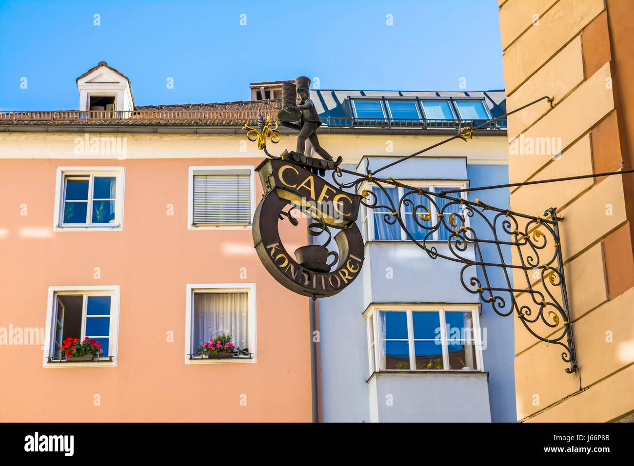 INNSBRUCK, AUSTRIA - AUGUST 23, 2017. Building architecture in Innsbruck with commercial street sign, Austria Stock Photo