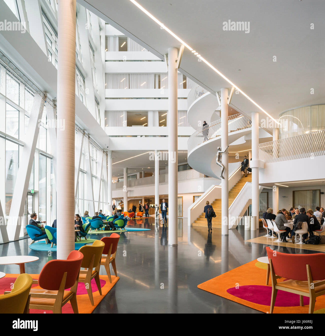 Lobby with spiral staircase and informal seating. Swedbank Head Office