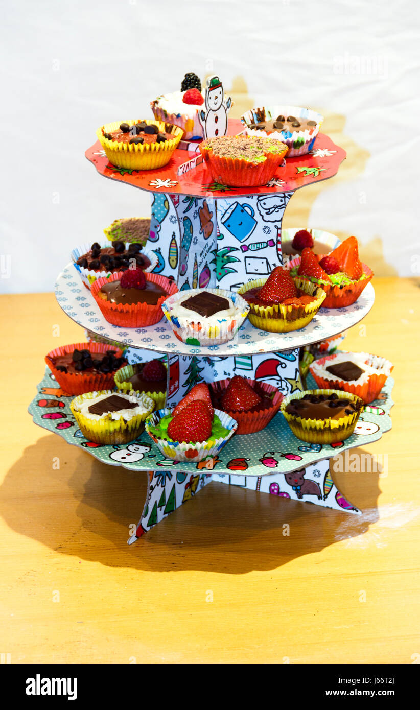 Homemade fancy cakes on a display stand Stock Photo Alamy
