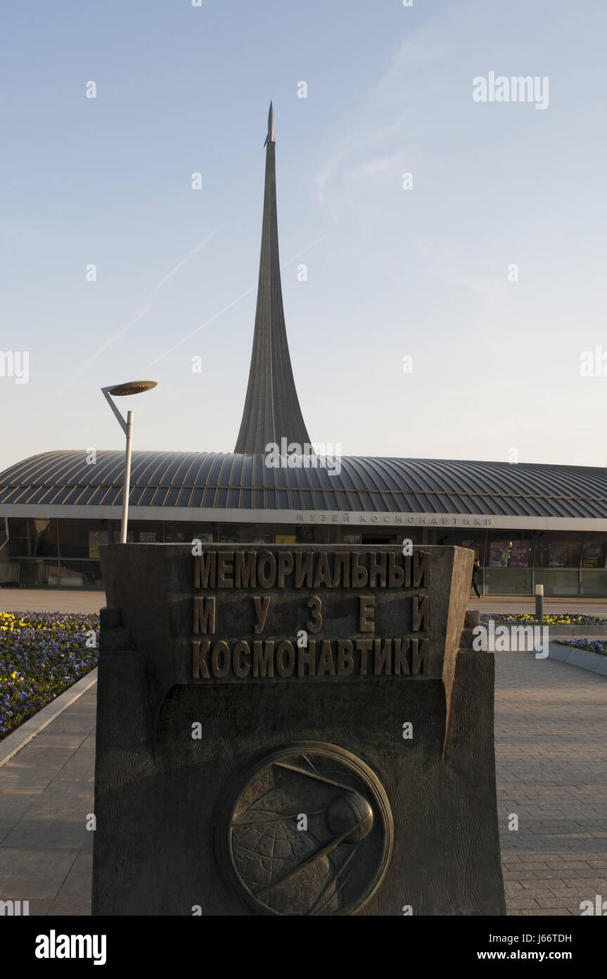 The sign of Museum of Cosmonautics with the Monument to the Conquerors of Space, built  to celebrate achievements of the Soviet people in the space Stock Photo